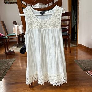 White sleeveless top with crochet details